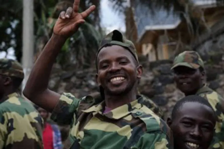 Combatentes do movimento M23 marcharam em Goma na terça-feira enfrentando pouca resistência
 (Phil Moore/AFP)