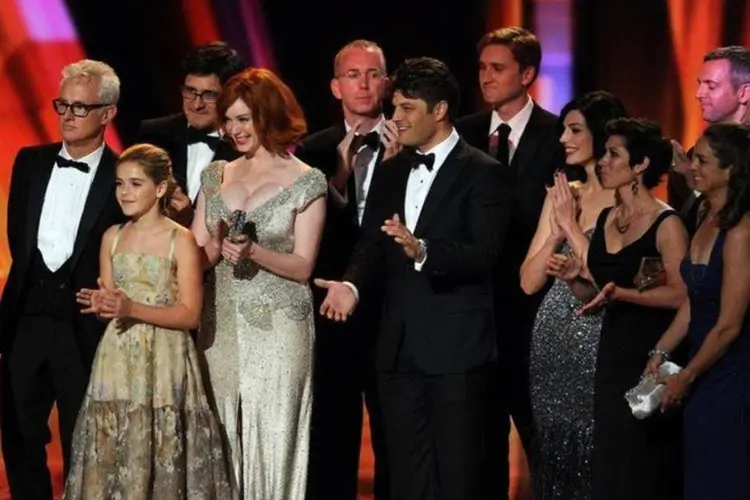 
	Equipe de &quot;Mad Men&quot; na cerim&ocirc;nia do Emmy: a 5&ordf; temporada - assistida por 3,5 milh&otilde;es de telespectadores - estreou em mar&ccedil;o de 2012
 (AFP/ Kevin Winter)