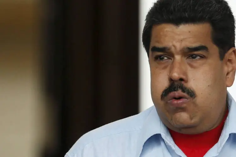 
	Nicol&aacute;s Maduro: &quot;Voc&ecirc;s acham que eles ir&atilde;o nos parar com um bloqueio financeiro? N&atilde;o, senhores. Ningu&eacute;m para a Venezuela&quot;
 (Carlos Garcia Rawlins / Reuters)