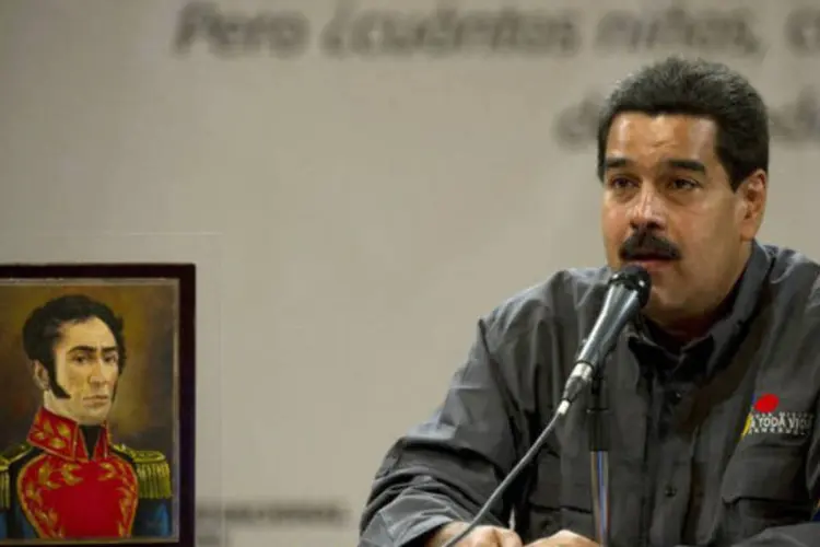 
	Nicol&aacute;s Maduro:&nbsp;&quot;Este &ocirc;nibus tem um motorista, que &eacute; Ch&aacute;vez, e tem um rumo: o socialismo&quot;, exclamou Maduro.
 (AFP / Juan Barreto)