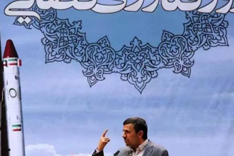 
	O presidente do Ir&atilde;, Mahmud Ahmadinejad: &quot;N&atilde;o pode haver uma guerra religiosa na S&iacute;ria&quot;, pa&iacute;s de maioria sunita dirigido por um cl&atilde; alau&iacute;ta, afirmou
 (AFP/ Arman Teimur)