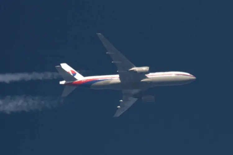 
	Boeing 777 da Malaysia Airlines: aeronave tinha 239 pessoas a bordo
 (Tomasz Bartkowiak/Files/Reuters)