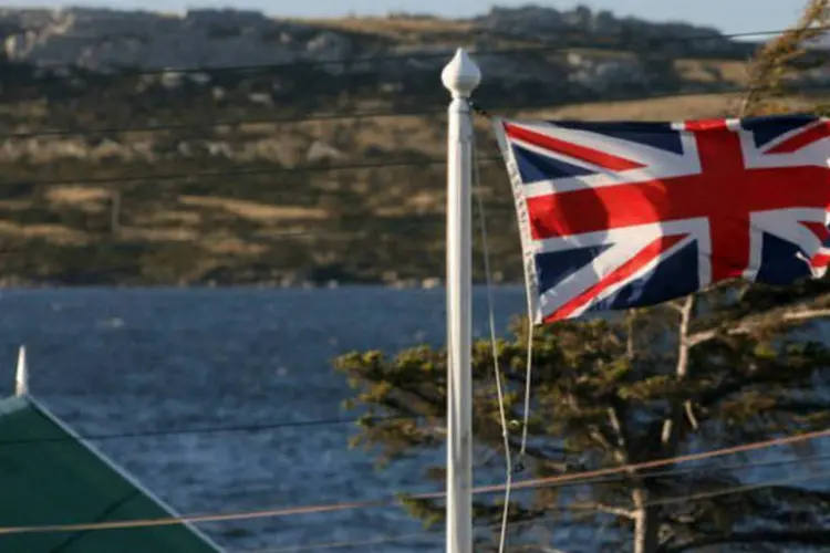 
	Bandeira do Reino Unido &eacute; vista nas Ilhas Malvinas:&nbsp;Reino Unido j&aacute; ressaltou que via como&nbsp;&quot;totalmente leg&iacute;tima&quot;&nbsp;a explora&ccedil;&atilde;o de petr&oacute;leo nas ilhas
 (AFP / Daniel Garcia)