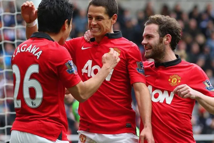 
	Jogadores do Manchester United: clube tem a maior bilheteria e as maiores vendas em dias de jogo do que qualquer outro do mundo
 (Jan Kruger/Getty Images)