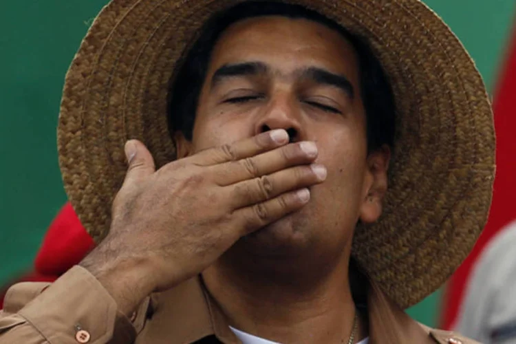 
	Nicol&aacute;s Maduro: &quot;Sua mensagem [do papa] &agrave; Venezuela &eacute; perfeita, eu convido todos os presentes nesta mesa de trabalho para que leiam e que o processem cada palavra, cada frase&quot;
 (Tomas Bravo/Reuters)