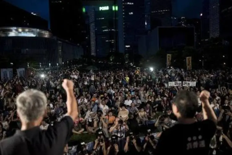 Benny Tai, líder do movimento Occupy Central, participa de ato pró-democracia em Hong Kong, em 31 de agosto de 2014 (Alex Ogle/AFP)