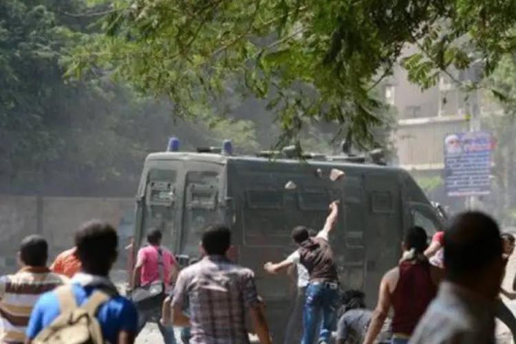 Manifestantes egípcios protestam no Cairo: analista avalia que "a maioria dos líbios sente nojo e vergonha" após o ataque de Benghazi
 (Khaled Desouki/AFP)