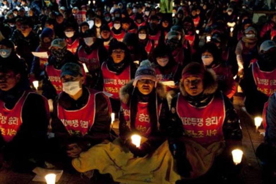 Manifestantes protestam contra a reunião G20 no centro de Seul (Victor Fraile/Getty Images)