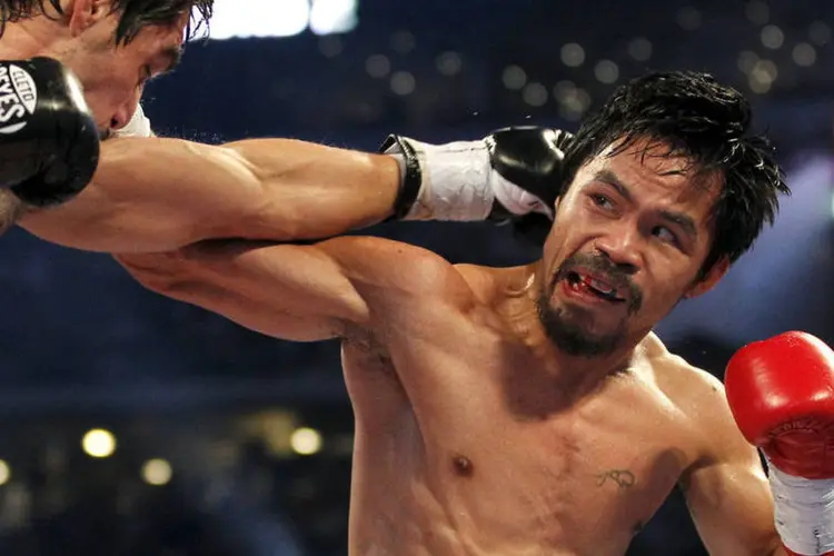 
	Manny Pacquiao: a opini&atilde;o do boxeador gerou grande repercuss&atilde;o nas Filipinas, onde o atleta ocupa tamb&eacute;m um cargo pol&iacute;tico
 (Mike Stone / Reuters)