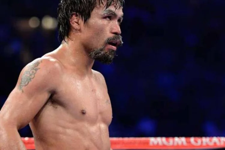 
	Manny Pacquiao: com 91% das urnas apuradas, Pacquiao tem 14,94 milh&otilde;es de votos, muito mais que o necess&aacute;rio para entrar no Senado
 (Getty Images)
