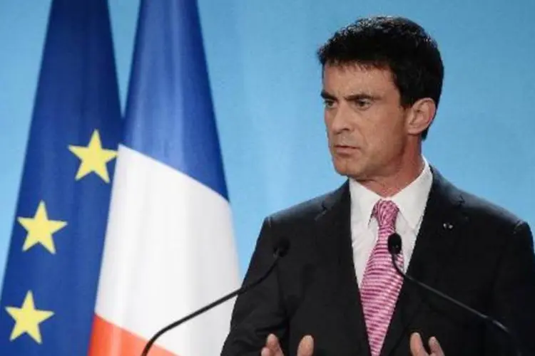 
	O premier da Fran&ccedil;a, Manuel Valls: &quot;a Fran&ccedil;a est&aacute; convencida de que n&atilde;o podemos correr o risco de que a Gr&eacute;cia saia da zona do euro&quot;
 (Stephane de Sakutin/AFP)