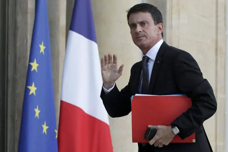 
	Manuel Valls: ele destacou que a Fran&ccedil;a est&aacute; realizando &quot;uma festa&quot; com a Eurocopa, mas lembrou que, ao mesmo tempo, &quot;a amea&ccedil;a est&aacute; presente&quot;
 (Philippe Wojazer/REUTERS)