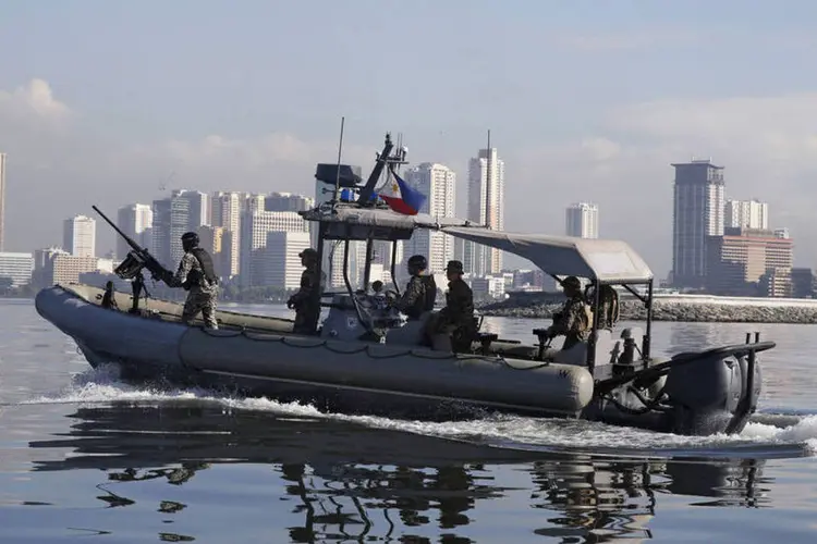 
	Militares: embora tenha se declarado neutro, os EUA criticaram abertamente as atividades de Pequim no Mar da China Meridional
 (Erik De Castro / Reuters)