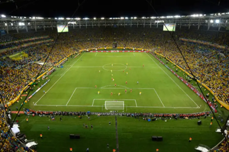 
	Maracan&atilde; lotado para a final da Copa das Confedera&ccedil;&otilde;es entre Brasil e Espanha: pa&iacute;s quer evitar que problemas de altos custos se repitam
 (Divulgação/ Consórcio Maracanã 2014)