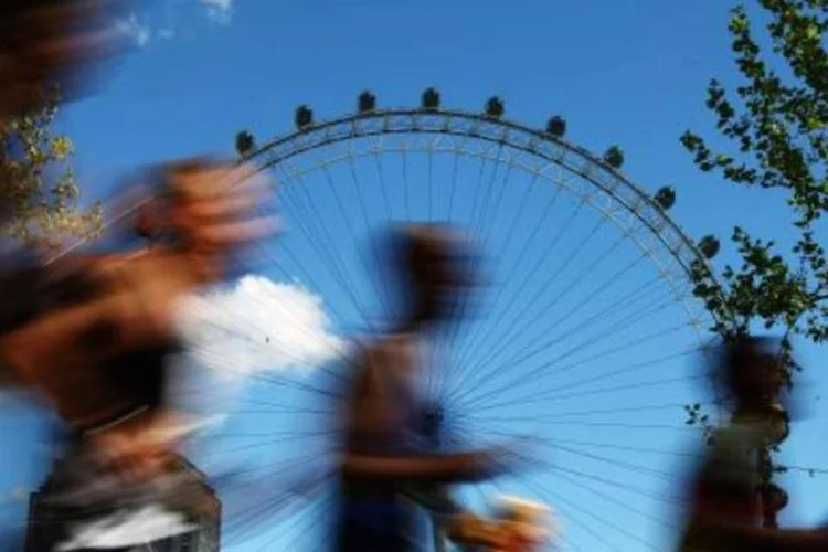 Corredores na Maratona de Londres: por pouco, o vulcão da Islândia não esvaziou o espetáculo.  (.)