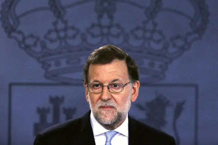 
	O primeiro-ministro interino da Espanha, Mariano Rajoy: Rajoy disse que n&atilde;o pretende renunciar como candidato a primeiro-ministro
 (REUTERS/Juan Medina)