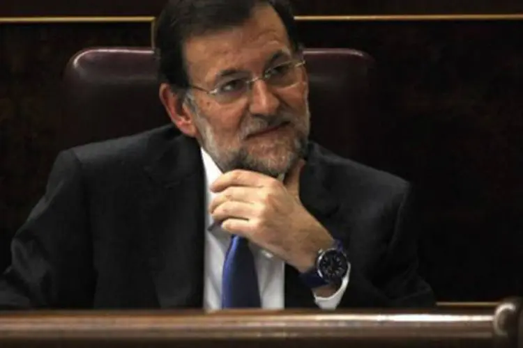 Mariano Rajoy antecipou que a Espanha deverá reduzir em 16,5 bilhões de euros seu déficit público em 2012, para cumprir o limite de 4,4% do PIB (Pierre-Philippe Marcou/AFP)