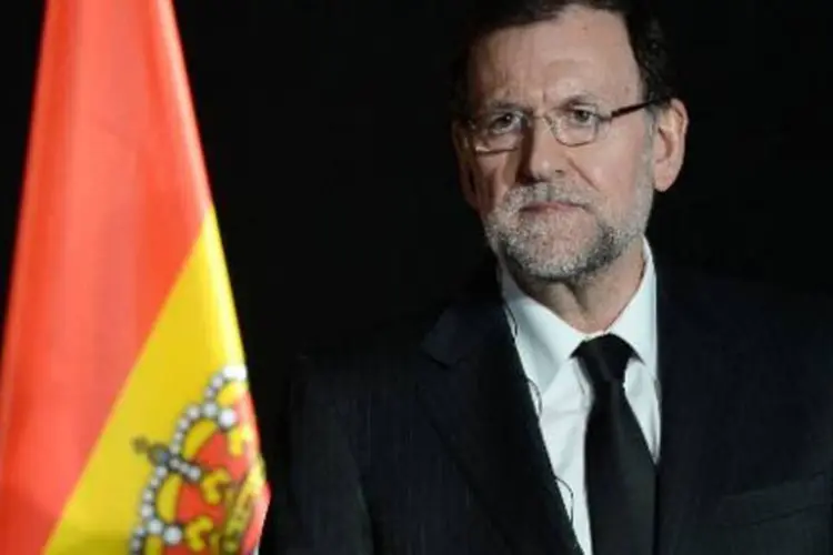 O premier espanhol, Mariano Rajoy: "Comovido com os últimos dados divulgados pelos investigadores. De novo, nosso abraço emocionado às famílias" (Boris Horvat/AFP)
