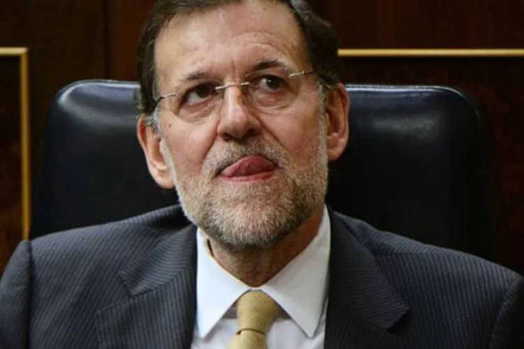 
	Mariano Rajoy: &quot;Eu respondo &agrave;s perguntas do Parlamento, vou respondendo tamb&eacute;m aos meios de comunica&ccedil;&atilde;o. Sempre venho dando uma resposta&quot;, afirmou o primeiro-ministro
 (©afp.com / Javier Soriano)