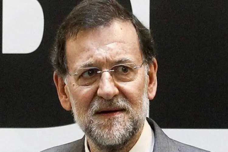 Mariano Rajoy:  afirmou  que adotará passos adicionais nos próximos dias para reduzir o déficit público, reforçando seu apelo para que a Europa implemente rapidamente o plano de resgate aos bancos espanhóis (Reuters/Andrea Comas)