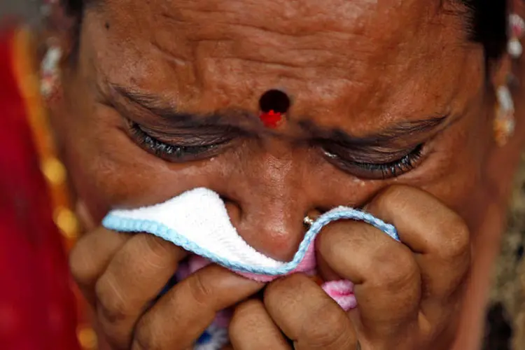 
	Parente de condenado: mais de mil pessoas morreram durante os dist&uacute;rbios interreligiosos em Gujarat
 (Amit Dave / Reuters)