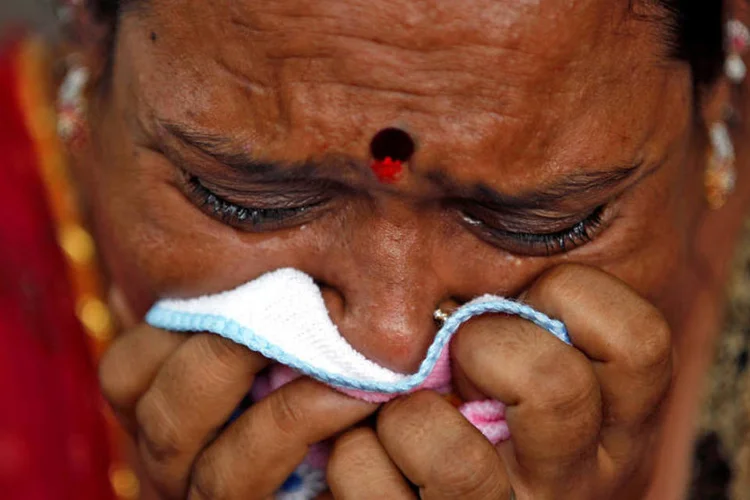 
	Parente de condenado: mais de mil pessoas morreram durante os dist&uacute;rbios interreligiosos em Gujarat
 (Amit Dave / Reuters)