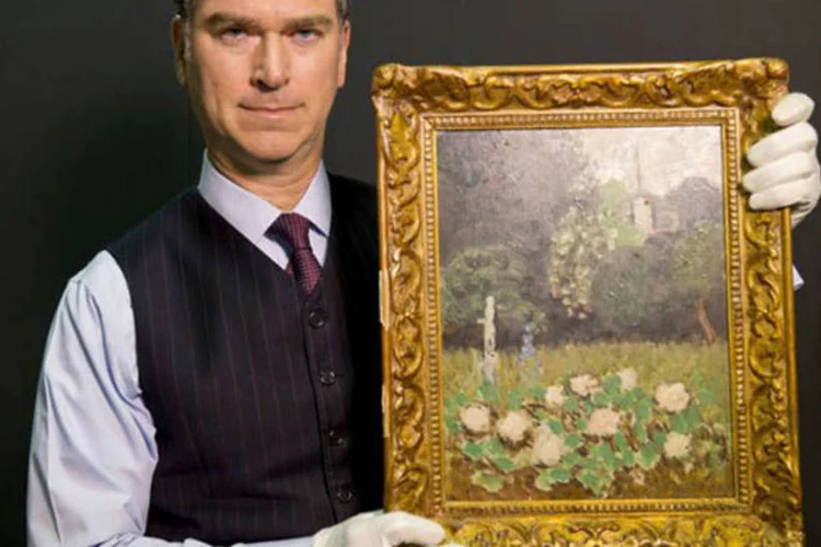 
	Marinello exibe a obra &quot;Le Jardin&quot;:&nbsp;equipe do Art Loss Register rapidamente identificou a obra como roubada de um museu sueco em 11 de maio de 1987
 (AFP/ Ray Wells)