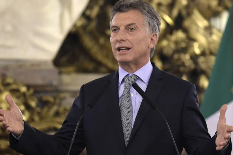 
	Mauricio Macri: presidente argentino teve primeira vit&oacute;ria pol&iacute;tica no Parlamento com a aprova&ccedil;&atilde;o da lei de negocia&ccedil;&atilde;o com os fundos.
 (Juan Mabromata / AFP)
