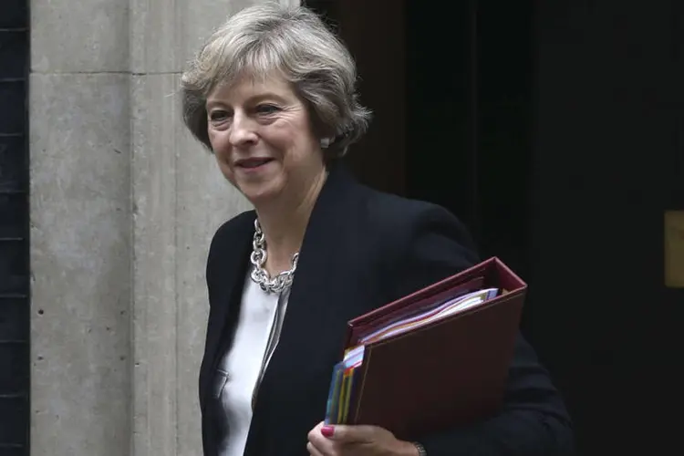 
	Theresa May: Tusk pediu &agrave; primeira-ministra que negocie com a UE o &quot;mais r&aacute;pido poss&iacute;vel&quot;
 (Neil Hall/Reuters)