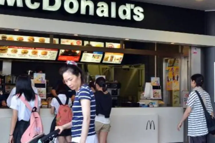 
	Loja da rede McDonald&#39;s: lucro por a&ccedil;&atilde;o ficou em 1,09 d&oacute;lar
 (Yoshikazu Tsuno/AFP)