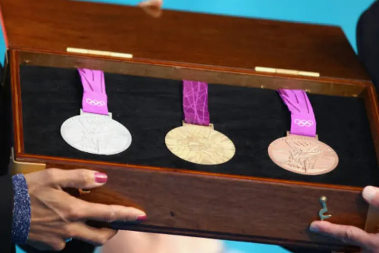 
	Medalhas das Olimpiadas de Londres: O sistema foi inaugurado nos Jogos Ol&iacute;mpicos de 1996, em Atlanta, e desde ent&atilde;o teve 70 audi&ecirc;ncias diferentes
 (Getty Images / Scott Olson)