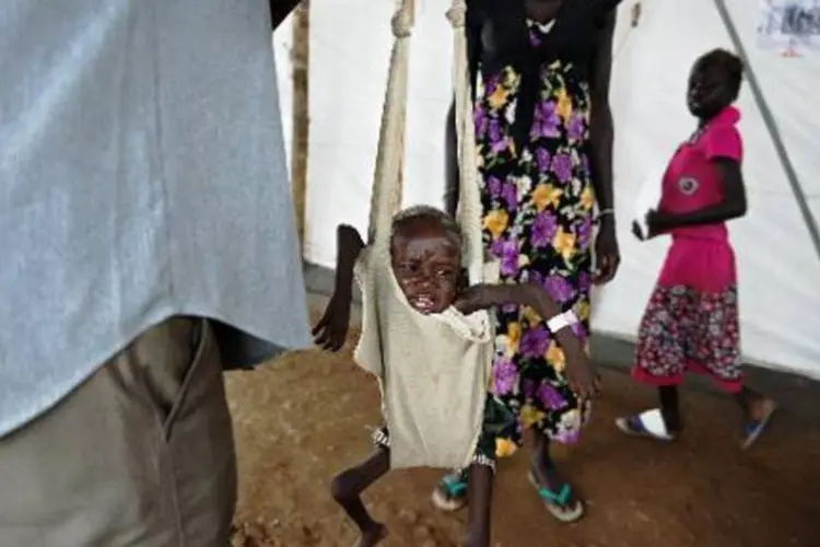 Menino é pesado no Sudão do Sul: milhares de pessoas vão sofrer, diz Oxfam (Charles Lomodong/AFP)