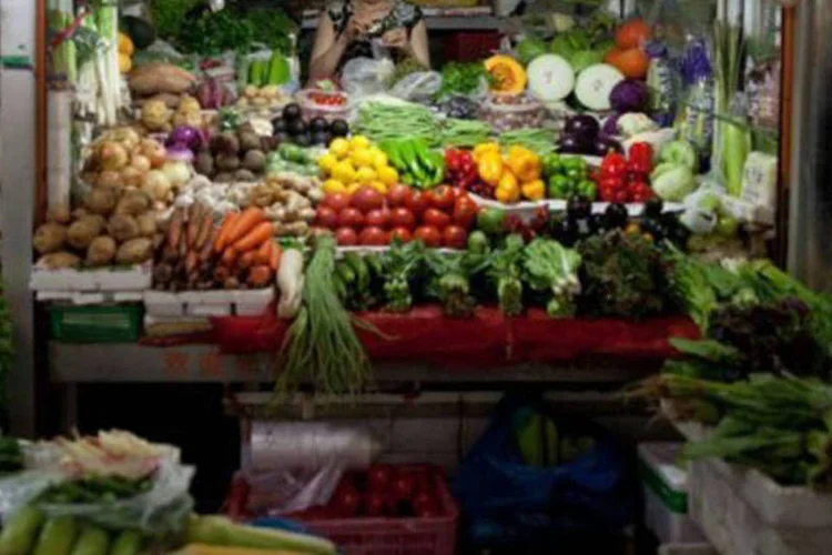 
	Mercado em Pequim: a economia chinesa registra seus &iacute;ndices de crescimento mais baixos em quase 25 anos
 (©AFP / Ed Jones)