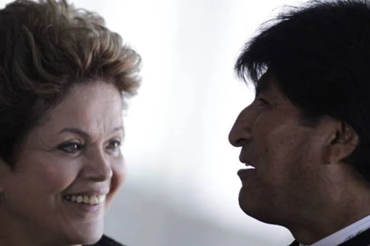 
	Dilma Rousseff com &nbsp; Evo Morales: o presidente boliviano pediu, na quarta-feira, que o governo brasileiro mandasse o senador de volta &agrave; Bol&iacute;via para que ele possa responder &agrave;s acusa&ccedil;&otilde;es de corrup&ccedil;&atilde;o contra si
 (Ueslei Marcelino/Reuters)