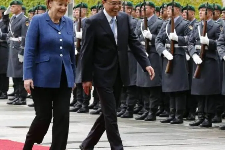 Merkel e Keqiang em Berlim: Merkel pediu que a China e a Comissão Europeia façam tudo o que puderem para chegar a um acordo (Reuters)