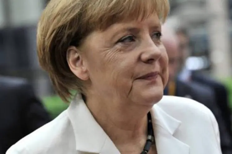 Merkel: "permanecemos no seguinte esquema: ajuda, contrapartida, condições e controle" (Georges Gobet/AFP)