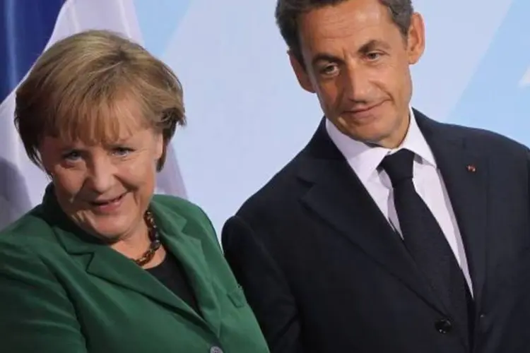 Angela Merkel e Nicolas Sarcozy negociam reforma de tratados (Sean Gallup/Getty Images)
