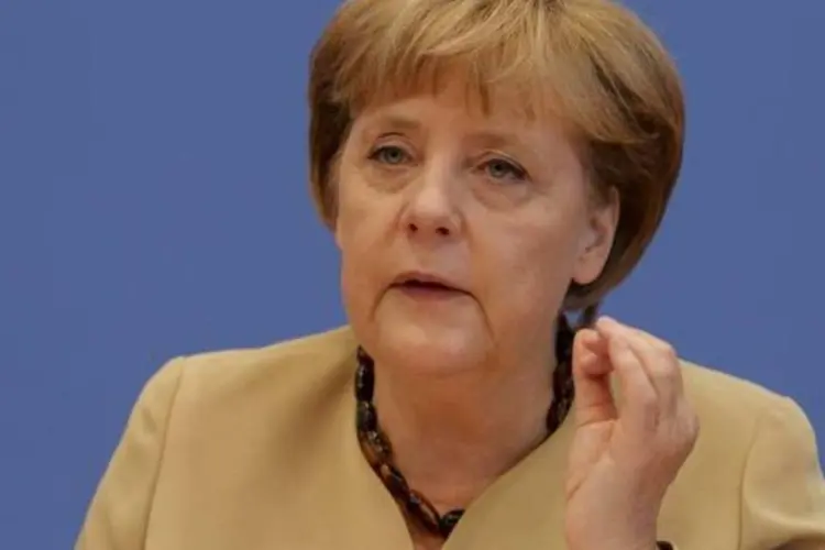 
	Merkel: &quot;Eu sempre menciono isso em conversas com lideran&ccedil;as chinesas e com o presidente russo. A situa&ccedil;&atilde;o humanit&aacute;ria &eacute; desesperadora...&quot;
 (Tobias Schwarz/Reuters)