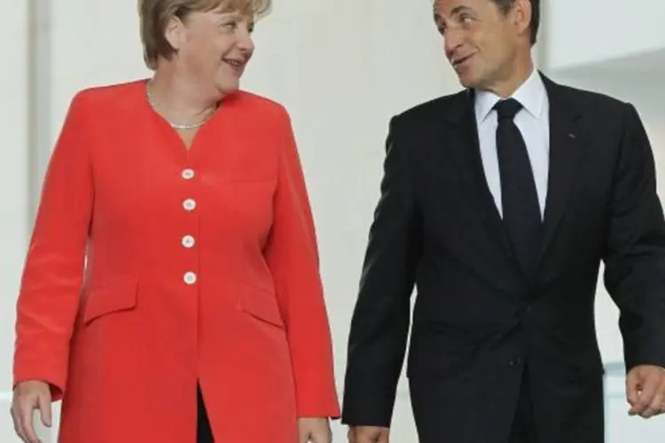 "Nós queremos declarar nossa absoluta determinação de defender o euro", afirmou Sarkozy depois da reunião com Merkel (Sean Gallup/Getty Images)