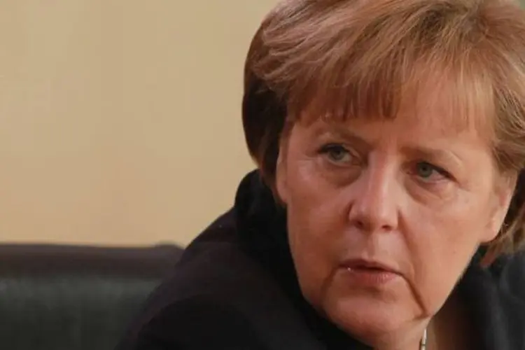 Merkel afirmou que quer que a Grécia permaneça como membro da zona do euro, mas que o memorando de entendimento acordado com credores internacionais deve ser seguido (Sean Gallup/Getty Images)