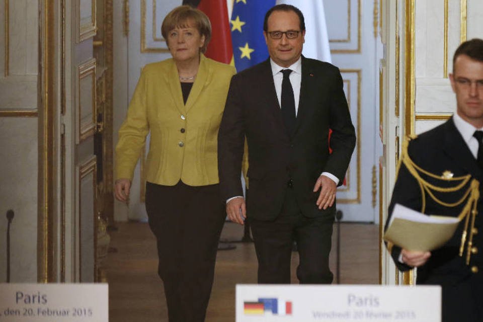 Hollande e Merkel pedem aplicação integral de cessar-fogo