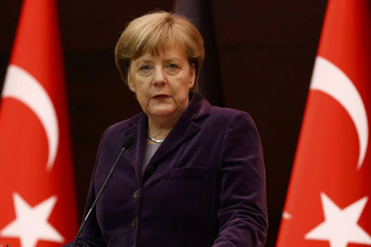 
	Angela Merkel: &quot;Se frearmos o fluxo ilegal, devemos encontrar um sistema de contingente para repartir a carga&quot;,
 (Umit Bektas / Reuters)