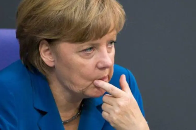 Angela Merkel no Bundestag, em Berlim (Thomas Peter/Reuters)