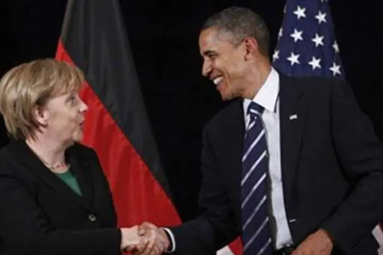 Obama e Merkel: presidente americano insistirá nos valores compartilhados pelo Velho Continente e os Estados Unidos (Jim Young/REUTERS)