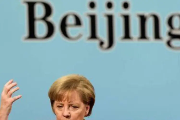 "A economia alemã se beneficiou globalmente com o euro", disse Merkel, (Ed Jones/AFP)
