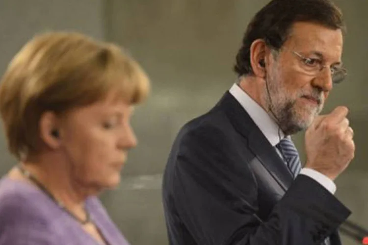 
	Mariano Rajoy e Angela Merkel: &#39;&#39;Acho que todos temos que entender que nenhum pa&iacute;s quer impor algo dif&iacute;cil a outro simplesmente porque sim&#39;&#39;, disse Merkel
 (Pierre-Philippe Marcou/AFP)
