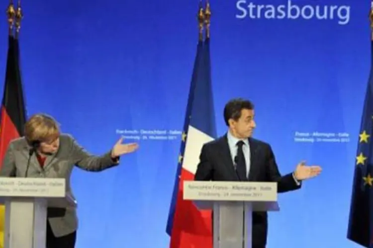 Sarkozy e Merkel deram "calorosas boas vindas" a Monti (Eric Feferberg/AFP)
