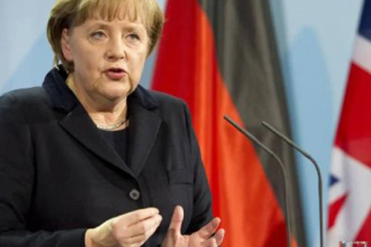 Após 'lamentar' a rejeição de Londres e lembrar que há 20 anos aconteceu o mesmo com o euro, Merkel destacou que apesar de tudo a Grã-Bretanha é 'um parceiro confiável da UE' (AFP)