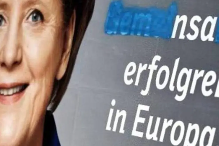 
	Poster de campanha eleitoral mostra Angela Merkel: Merkel n&atilde;o &eacute; candidata, mas seu retrato est&aacute; estampado por todas as ruas da Alemanha. &quot;Juntos pelo sucesso na Europa&quot; (DPA/AFP)