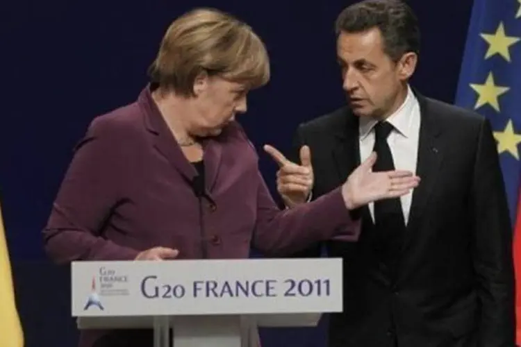 Angela Merkel e Nicolas Sarkozy: apoio para a criação da taxa (Thomas Coex/AFP)